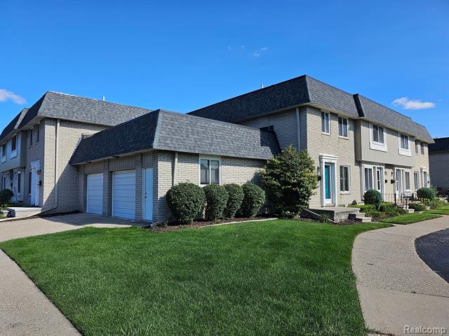 front view picture of 4302 15 Mile Road, Sterling Heights, MI. 48310