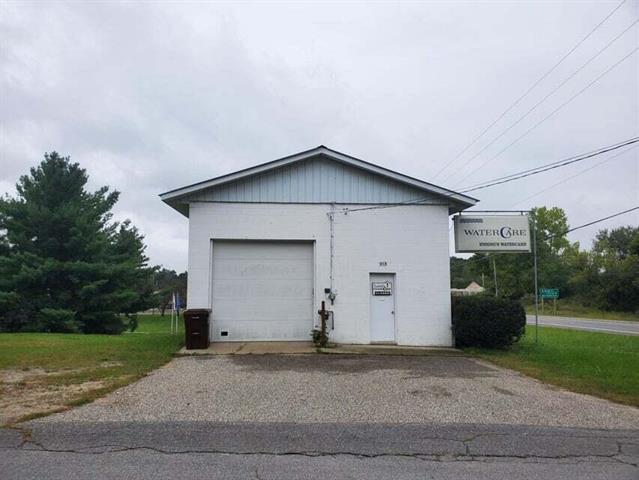 front view picture of 313 N Vesta Street, Six Lakes, MI. 48886