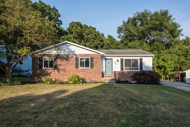 front view picture of 213 Woodlake Drive, Brighton, MI. 48116
