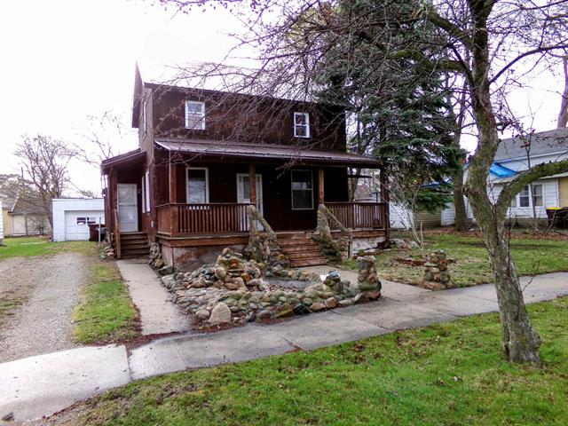 front view picture of 116 N Main, Saint Louis, MI. 48880
