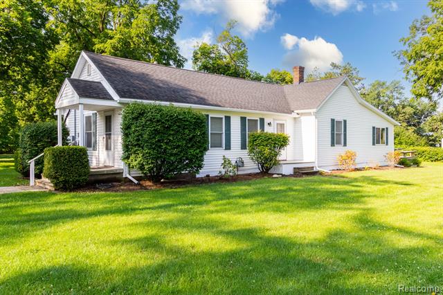 front view picture of 21809 West River Road, Grosse Ile, MI. 48138
