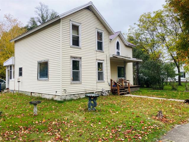 front view picture of 344 S Pine St, Evart, MI. 49631