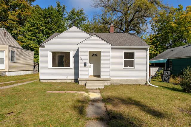 front view picture of 124 Spring Street, Battle Creek, MI. 49037