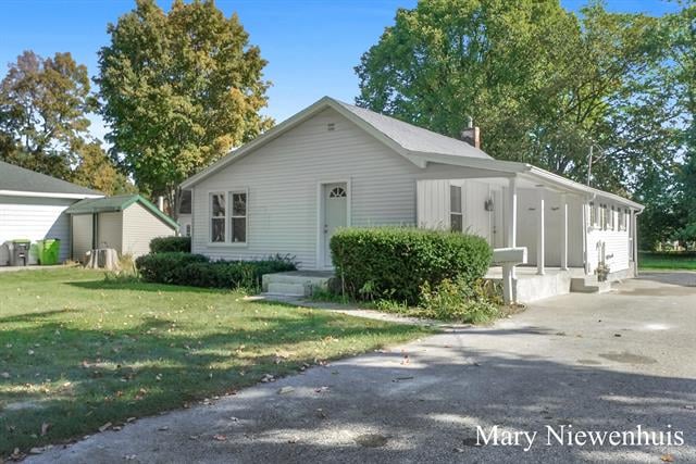 front view picture of 908 S Lake Street, Greenville, MI. 48838
