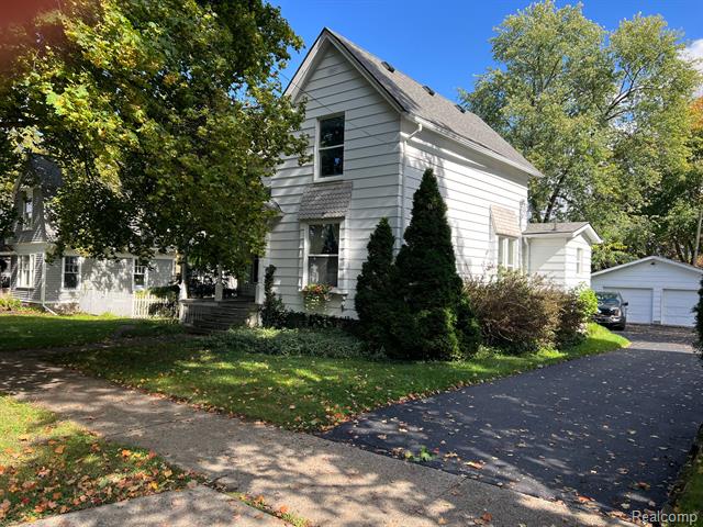 front view picture of 509 S East Street, Chelsea, MI. 48118
