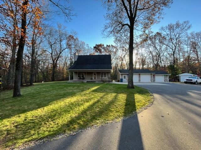 front view picture of 3395 Stronach Road, Manistee, MI. 49660
