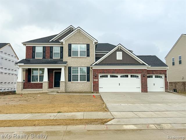 front view picture of 49477 Hummel Dr, Macomb, MI. 48044