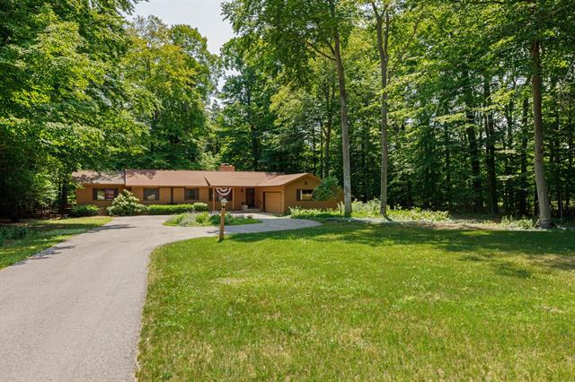front view picture of 3862 N Trillium Drive, Leland, MI. 49654