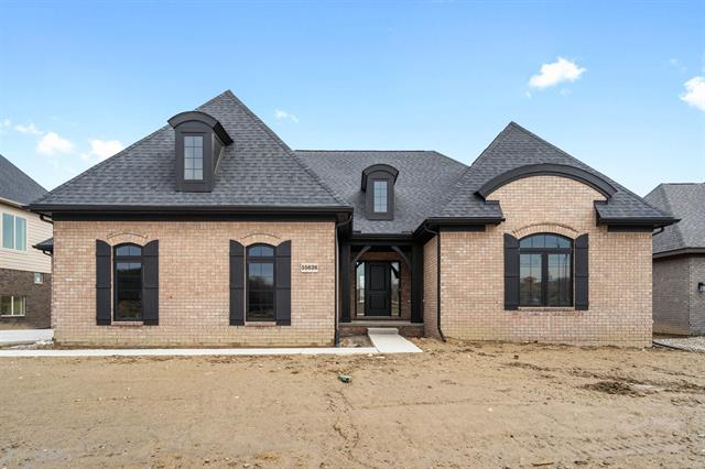 front view picture of 55638 Bay Oaks, Utica, MI. 48315
