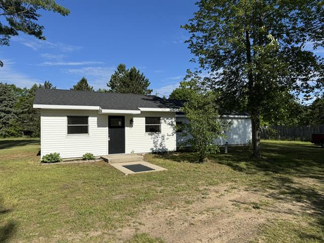 front view picture of 17310 Spring Street, Wellston, MI. 49689