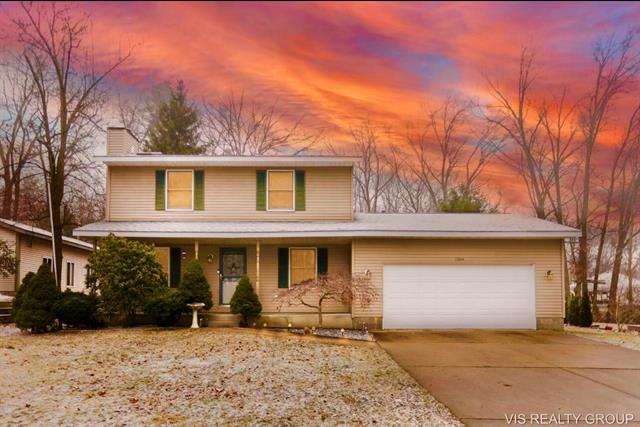 front view picture of 15844 Cotters Lane, Spring Lake, MI. 49456