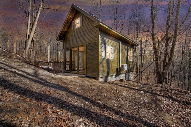 front view picture of 132 Shores Drive, Leroy, MI. 49655