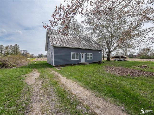 front view picture of 13680 Martinsville Road, Carleton, MI. 48117