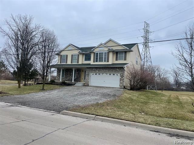 front view picture of 31011 Olmstead Road, Rockwood, MI. 48173