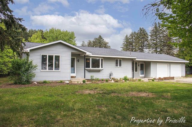 front view picture of 315 Hayes Road Nw, Comstock Park, MI. 49321