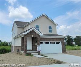 front view picture of 471 Pattan Drive, Wixom, MI. 48393