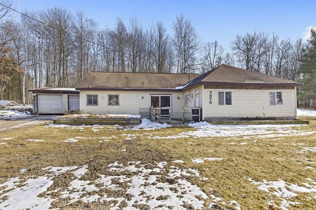 front view picture of 7979 Ojibwa Drive, Weidman, MI. 48893