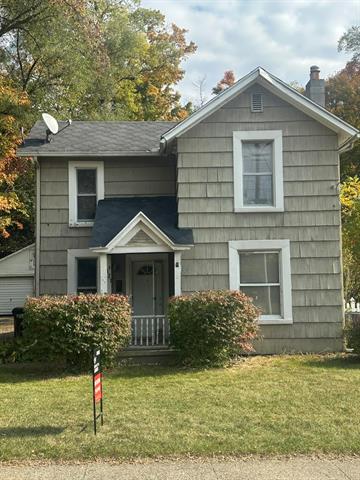 front view picture of 121 Maple Street, Grass Lake, MI. 49240