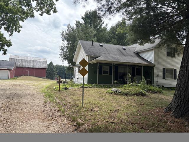 front view picture of 22347 5 Mile Road, Morley, MI. 49336