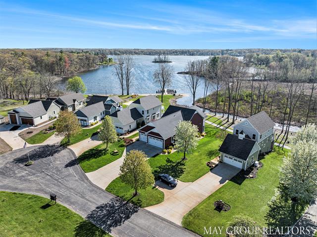 front view picture of 13460 Cottage View Court, Gowen, MI. 49326