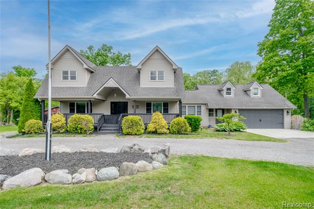 front view picture of 12631 9 Mile Road, South Lyon, MI. 48178