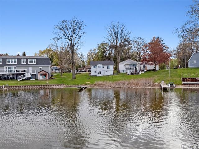 front view picture of 490 Chicago Drive, Howell, MI. 48843