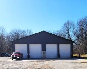 front view picture of 9795 Lake Station Avenue, Lake, MI. 48632