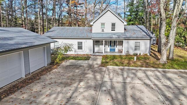 front view picture of 6836 Nw Aarwood Trail, Rapid City, MI. 49676