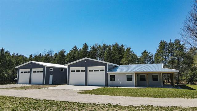 front view picture of 12165 Tenth Street, Bear Lake, MI. 49614