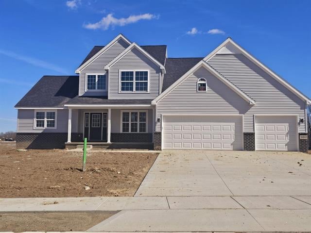 front view picture of 10661 Valley View Drive, Saline, MI. 48176