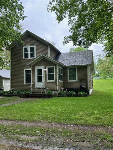 front view picture of 611 Rock River Avenue, Three Rivers, MI. 49093