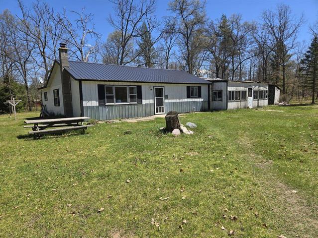 front view picture of 3664 N Hamlock Lane, Irons, MI. 49644