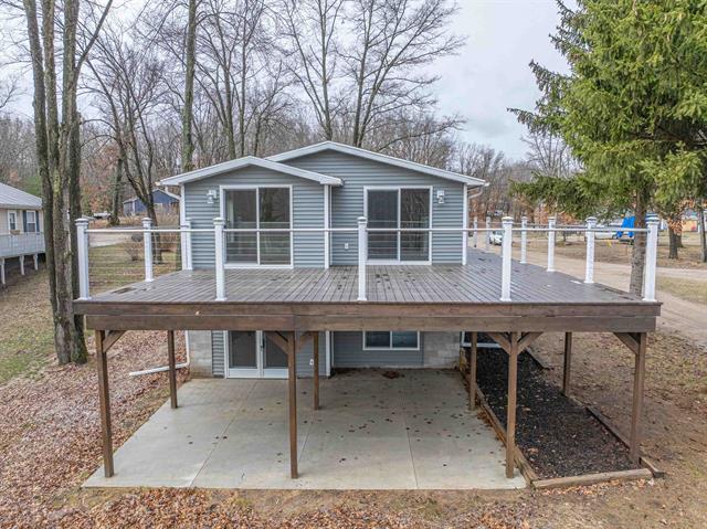 front view picture of 6820 W Shore, Weidman, MI. 48893