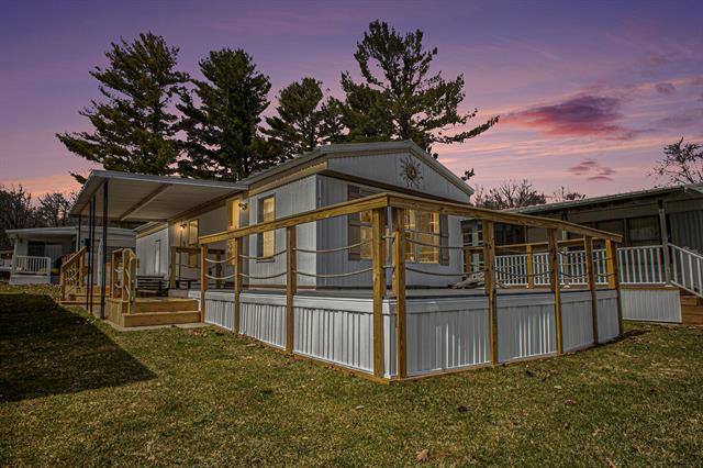 front view picture of 15301 Lakeshore Drive, Gowen, MI. 49326