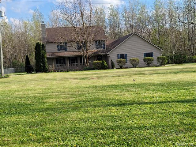 front view picture of 11275 W Coon Lake Road, Webberville, MI. 48892