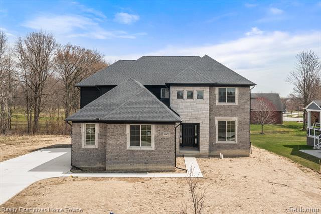 front view picture of 53972 Carrigan Drive, New Baltimore, MI. 48047