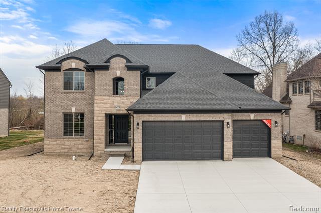 front view picture of 54370 Coachford Drive, New Baltimore, MI. 48047