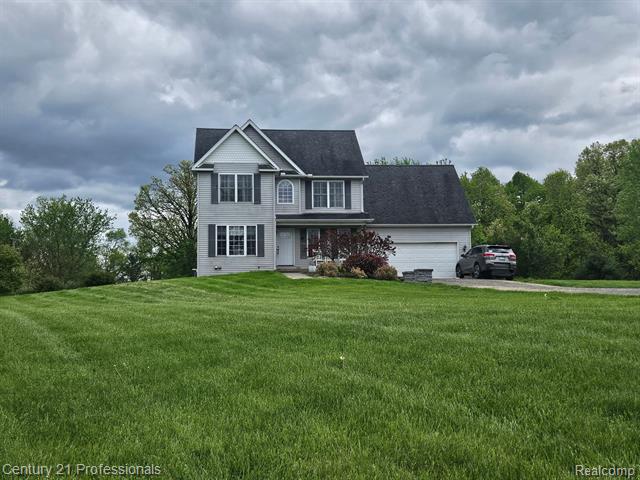 front view picture of 1451 Ashlyn Court, Fowlerville, MI. 48836
