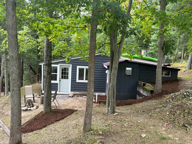 front view picture of 1112 Lake Drive, Harrison, MI. 48625