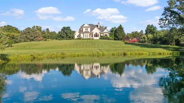 front view picture of 1280 Sylvan Road, Chelsea, MI. 48118