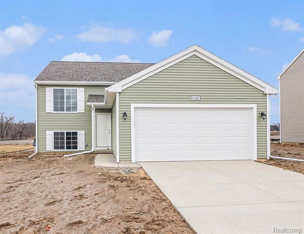 front view picture of 8346 Majestic Boulevard, Fowlerville, MI. 48836