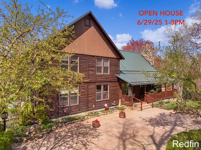 front view picture of 9547 Downes Street Ne, Lowell, MI. 49331