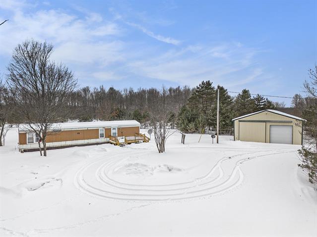 front view picture of 198 Alaina Lane Lane, Mesick, MI. 49668