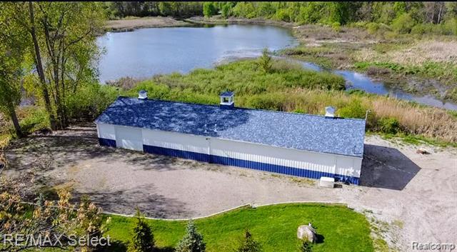 front view picture of 1080 Butcher Road, Fenton, MI. 48430