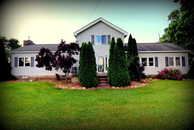 front view picture of 606 E Girard Road, Quincy, MI. 49082