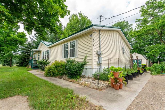 front view picture of 11276 S Harrison, Farwell, MI. 48622