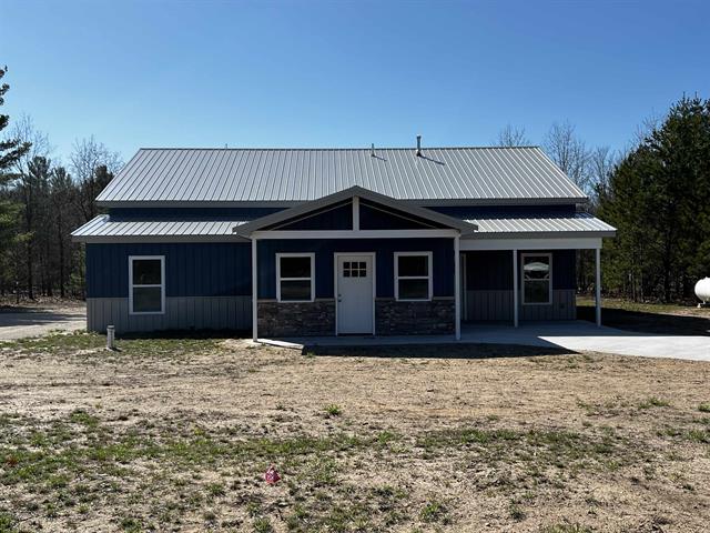 front view picture of 7918 Nw Springwater, Rapid City, MI. 49676