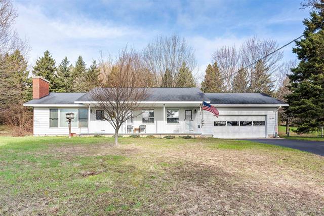 front view picture of 7800 S Lake Shore, Cedar, MI. 49621