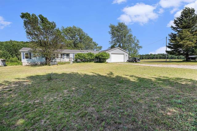 front view picture of 11816 Morton Road, Manistee, MI. 49660