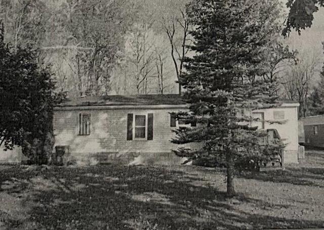 front view picture of 5450 Highland Drive, Mecosta, MI. 49332